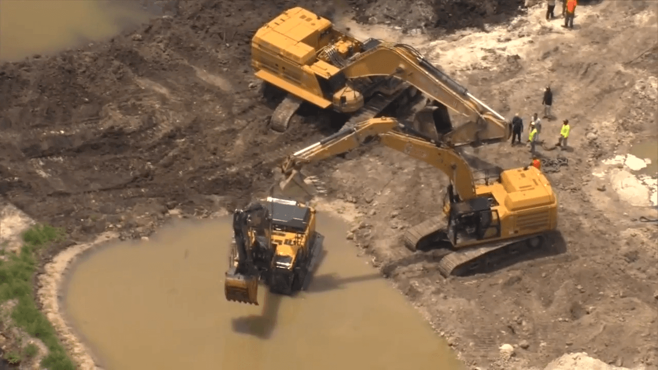 Crane falls into water at Davie construction site; no injuries reported