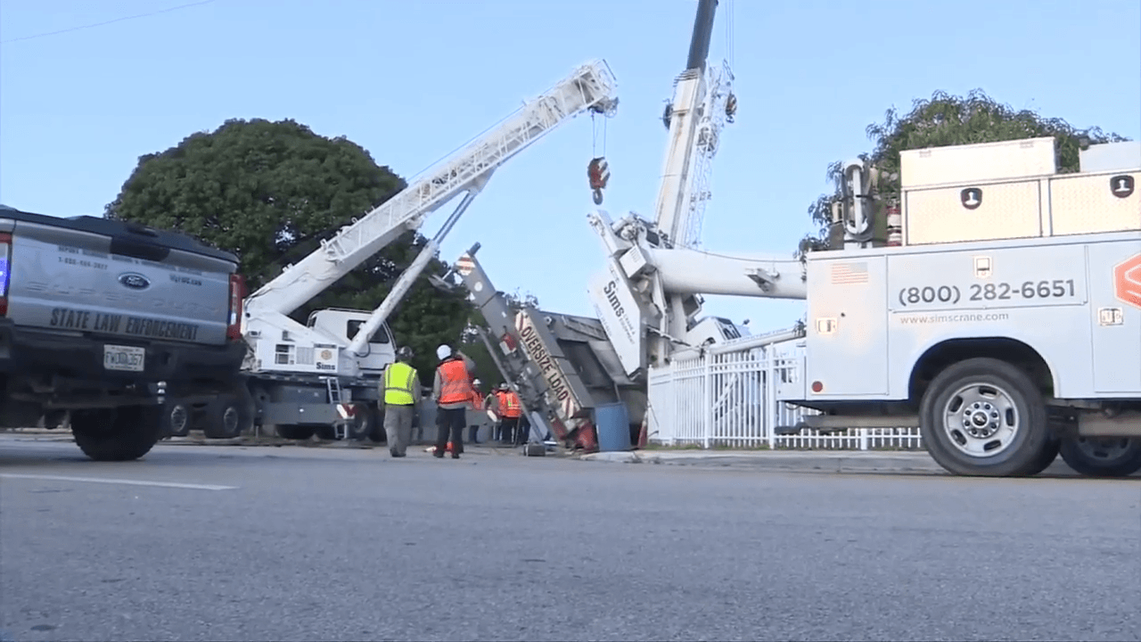 Crane falls over in front of 2 homes in Hialeah; no injuries reported