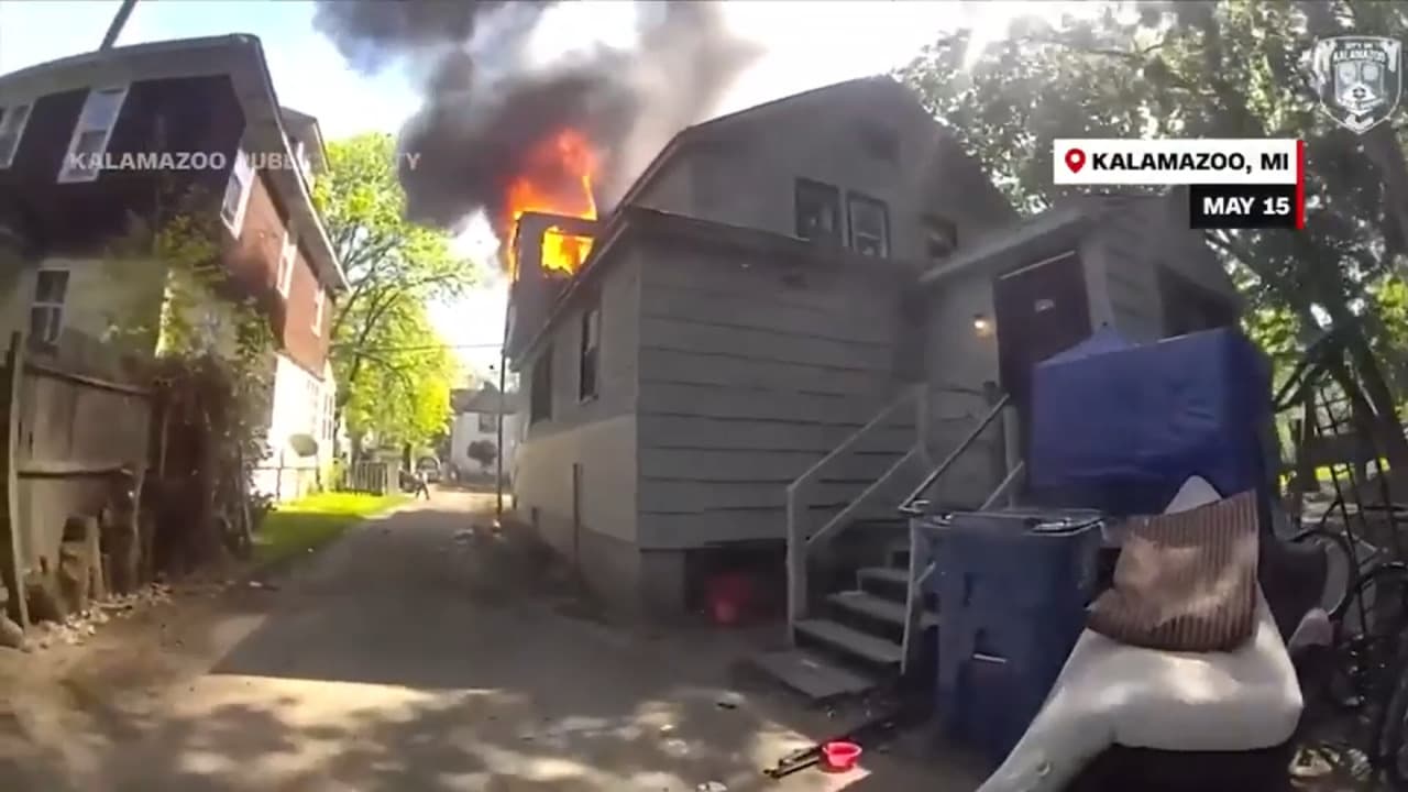 Video captures Kalamazoo officer catching baby tossed from burning home