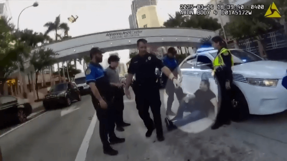 Body camera footage captures police response to brutal street attack by group of bikers; officer seen sitting in cruiser resigns