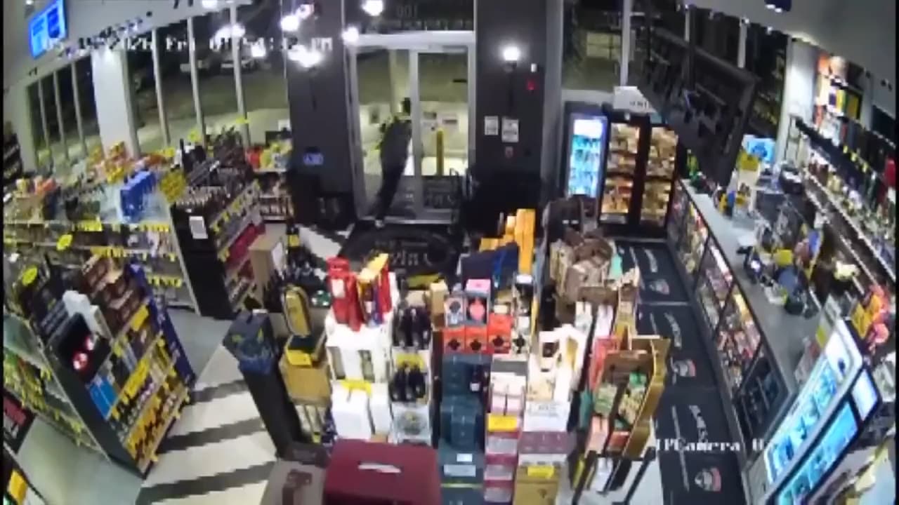 Surveillance video captures man stealing liquor from Brickell store; search underway for subject