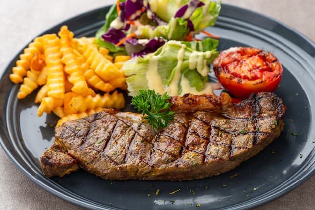 The Steaming Sirloin Squeeze: How Casual Steakhouses Are Navigating the Historic Surge in Beef Costs